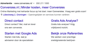 Google Ads advertentie met extensies